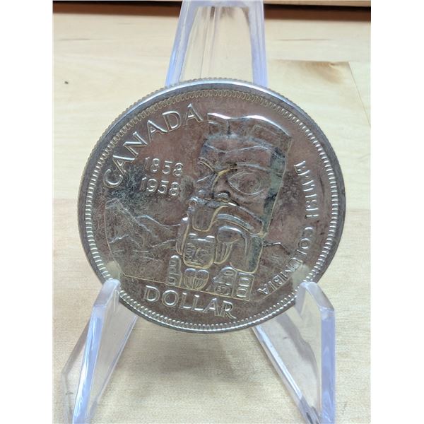 Lot 133-1) 1 Canadian silver Dollar 1958