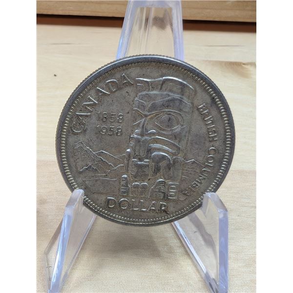 Lot 141-1) 1 Canadian silver Dollar 1958