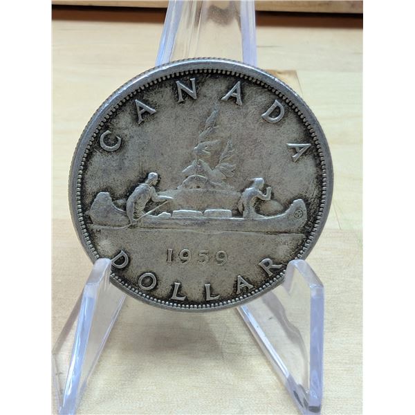 Lot 147-1) 1 Canadian silver Dollar 1959
