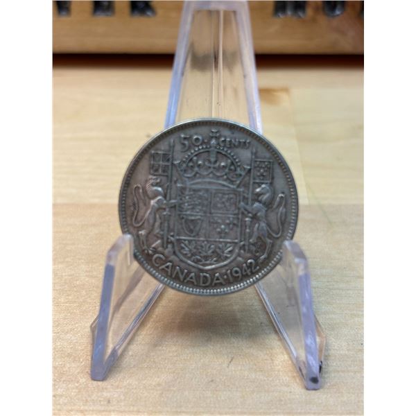 Lot 56-1) Canadian silver 50c 1942
