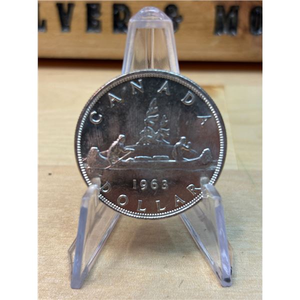 Lot 57-1) 1 Canadian silver Dollar 1963