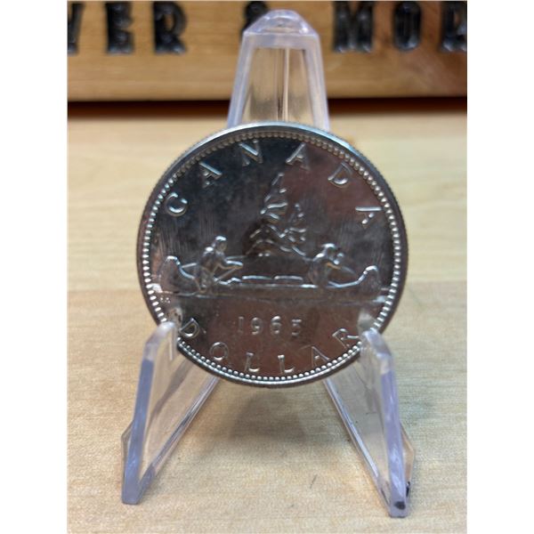 Lot 65-1) 1 Canadian silver Dollar 1963