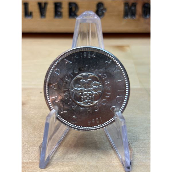 Lot 67-1) 1 Canadian silver Dollar 1964