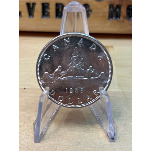Lot 83-1) 1 Canadian silver Dollar 1963