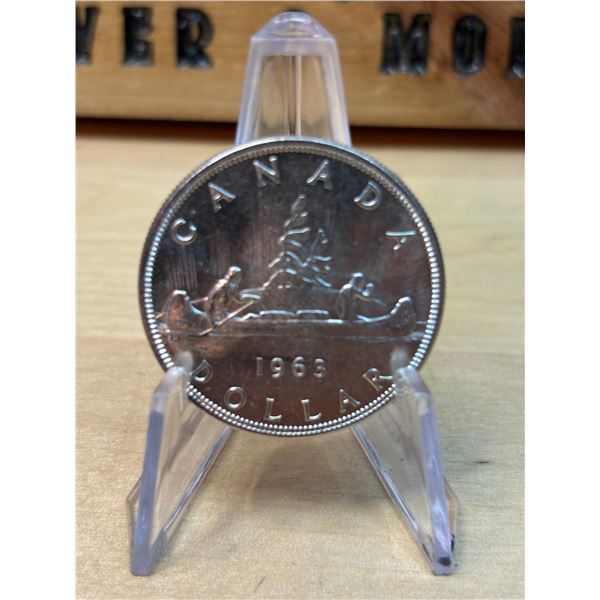 Lot 87-1) 1 Canadian silver Dollar 1963