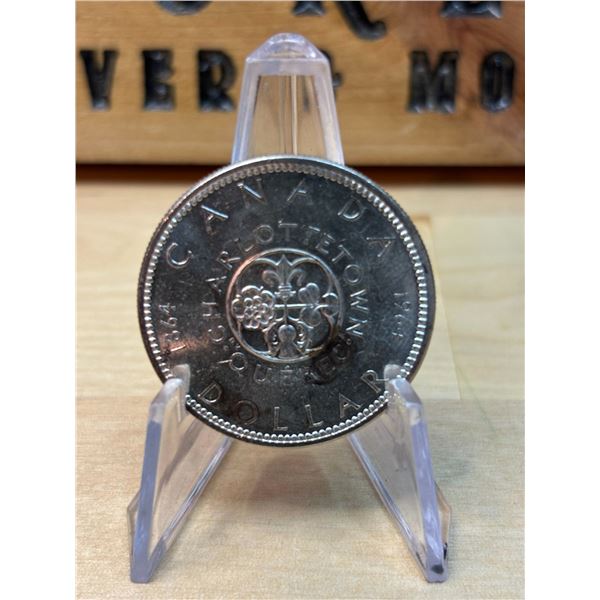 Lot 101-1) 1 Canadian silver Dollar 1964