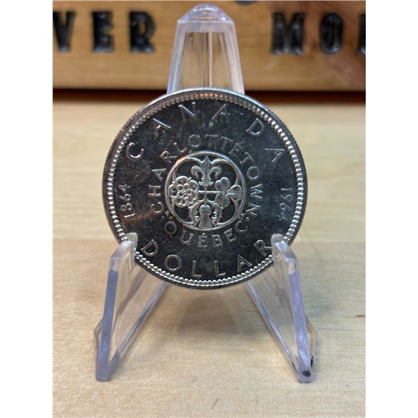 Lot 115-1) 1 Canadian silver Dollar 1964