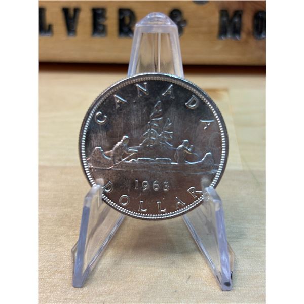 Lot 119-1) 1 Canadian silver Dollar 1963