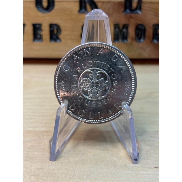 Lot 129-1) 1 Canadian silver Dollar 1964