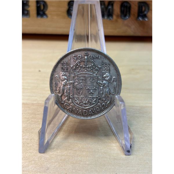 Lot 144-1) Canadian silver 50c 1942