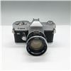 Image 1 : Canon Pellix QL 35mm SLR Film Camera with Canon Lens