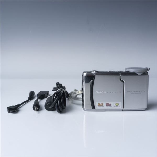 Nikon Coolpix S4 Digital Camera with Accessories, Silver