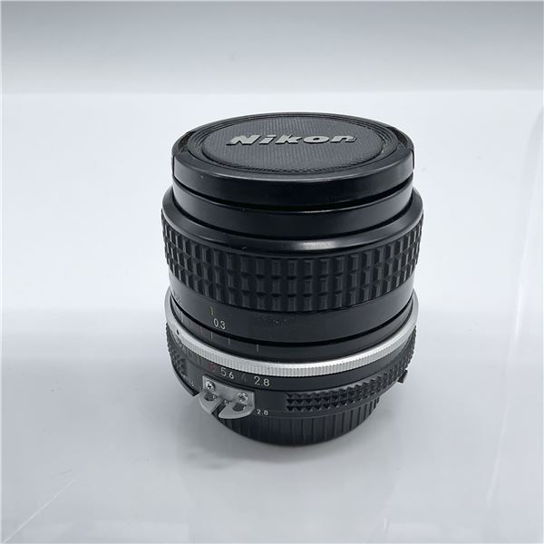 Nikon 24mm f/2.8 AI Lens with Caps, 2.75"H