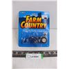 Image 1 : ERTL "Farm Country" Die Cast Ford 5640 Tractor with Loader (NIB)