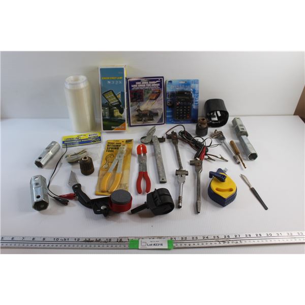 Sensor Street Lamp, Sonic Animal Guard, Retaining Spring Tool, Caulk Line, Foldable Knife, Calculato