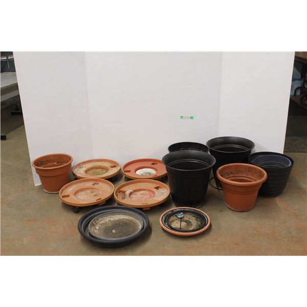 *(7) Large Flower Pots and (4) Rolling Caddies