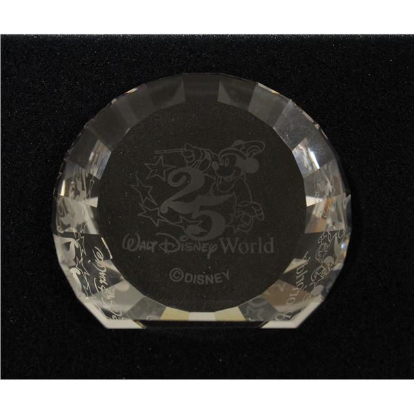 A Walt Disney World 25 Years Celebration faceted Swarovski Crystal Paperweight by Disney Showcase.