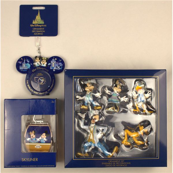 A selection of Walt Disney World 50th Anniversary Ornaments and Skyliner replica.