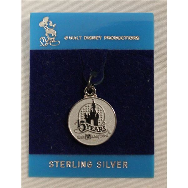 A Walt Disney World 15 Yr Anniversary Charm.