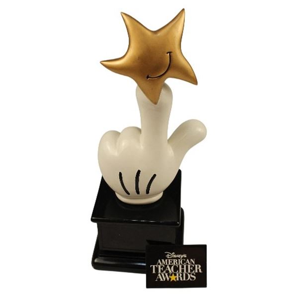 A Disney's American Teacher Award and Button.