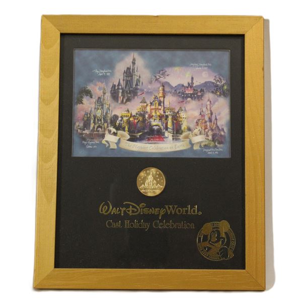 A Walt Disney World Cast Framed Print and Coin.