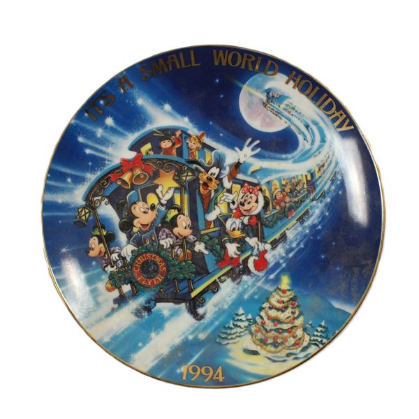 An "It's A Small World Holiday" Plate.
