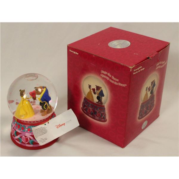 A Beauty and the Beast Snow Globe.