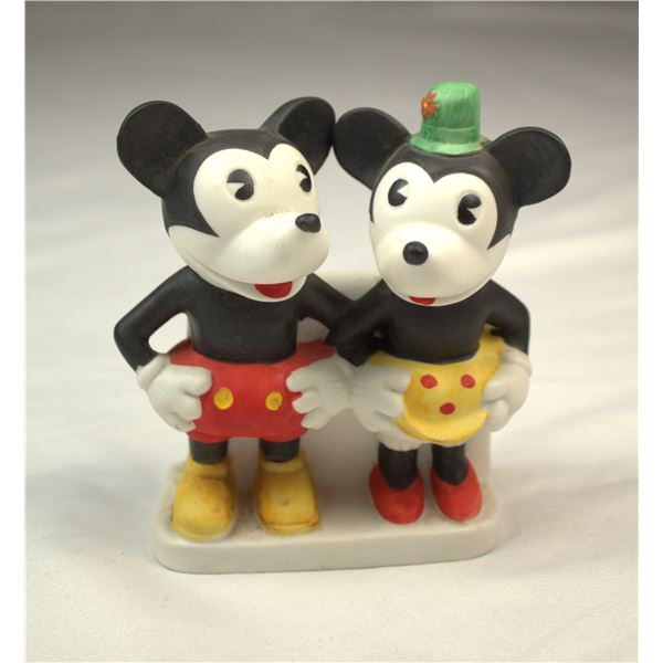 A rare reproduction of a 1930s Pie-eyed Mickey and Minnie Mouse Bisque toothbrush holder.