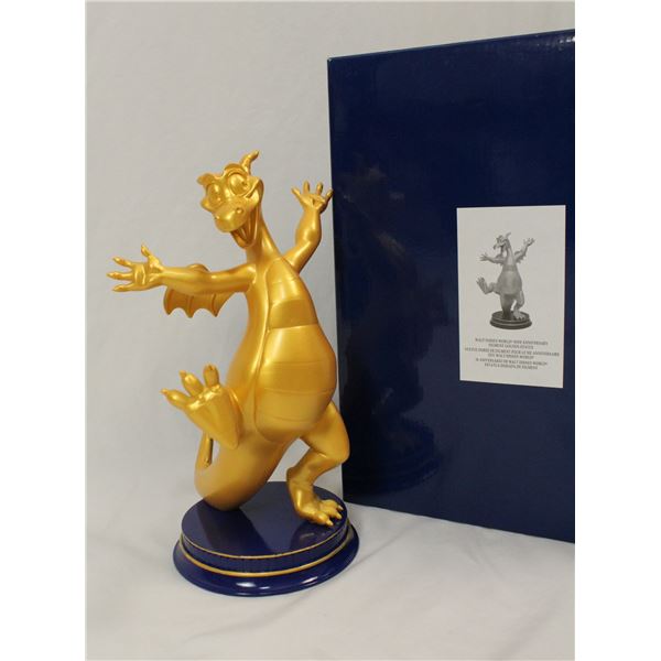 A Walt Disney World 50th Anniversary Figment Golden Statue.