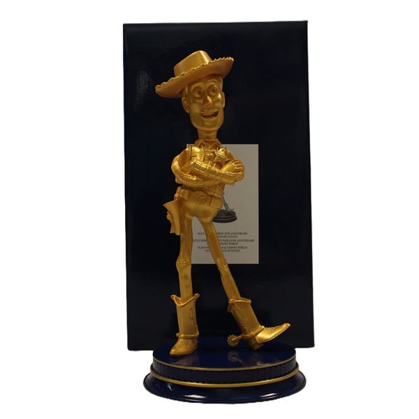 A Walt Disney World 50th Anniversary Woody Golden Statue.