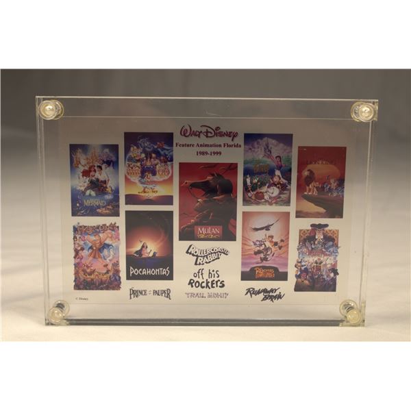 A Walt Disney Feature Animation Florida Cell paperweight.
