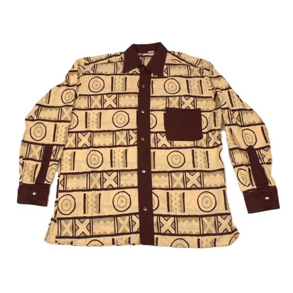 An Animal Kingdom Cast Member shirt.