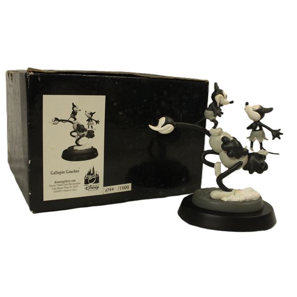 A Mickey and Minnie Vintage Figurine.