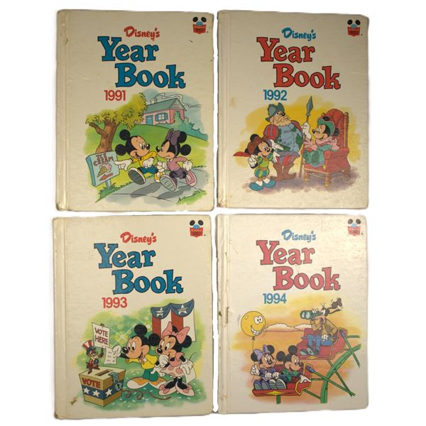 A Set of 4 Disney's Year Books.