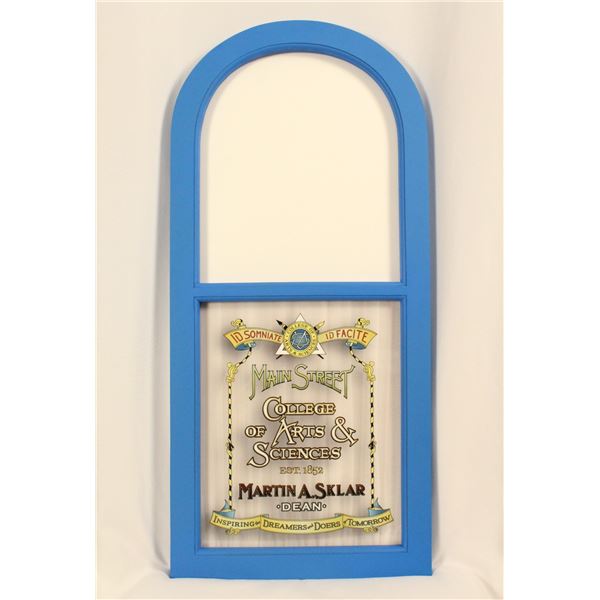 A Replica Marty Sklar Main Street Window.