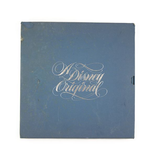 A Disneyland 25th Anniversary Commemorative Plate.