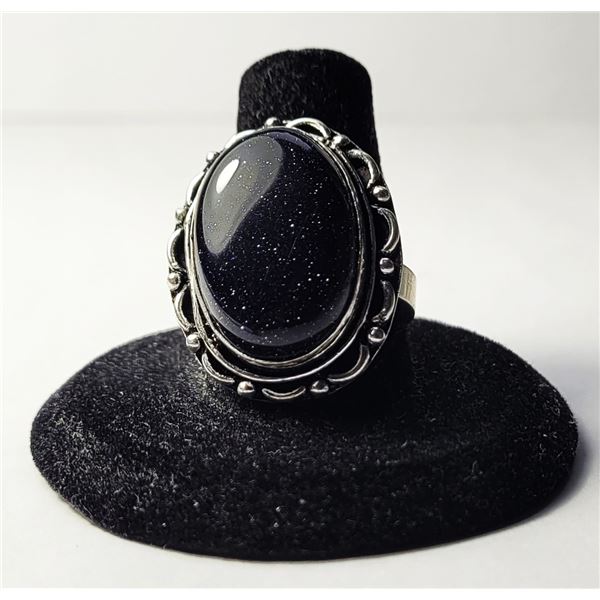 29)  NATURAL OVAL BLUE SUN STONE SIZE 7.5 RING