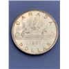 Image 1 : 1961 Canada Silver Dollar Coin Featuring Elizabeth II and Voyageur Design
