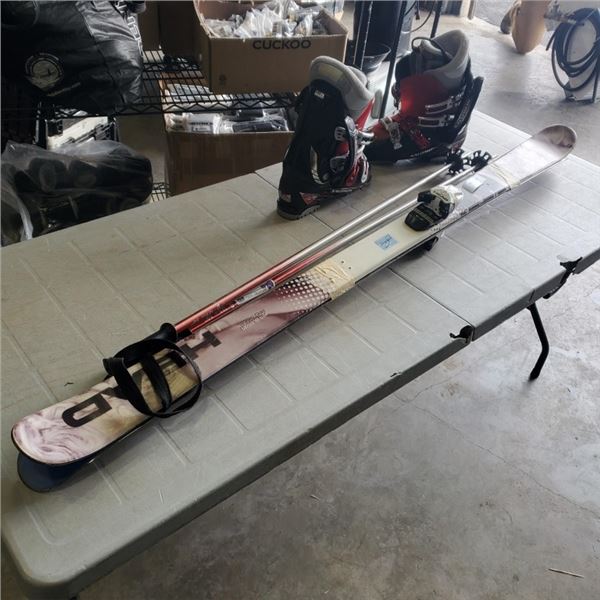 PAIR OF SKIIS WITH POLES AND PAIR OF SOLOMAN BOOTS
