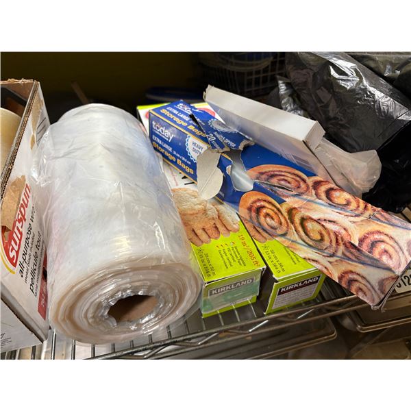 Shelf lot full of assorted garbage bags, Ziplock bags, food wrapper