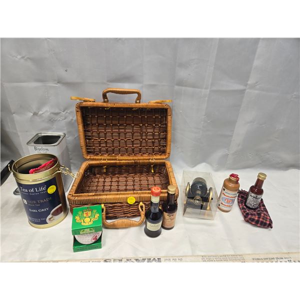 LOT OF TEA/VARIOUS MINI ALCOHOL IN BASKET.