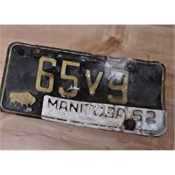 plated for 1962, over older plate, Manitoba Passenger License Plate 65V9