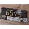 Image 1 : plated for 1962, over older plate, Manitoba Passenger License Plate 65V9