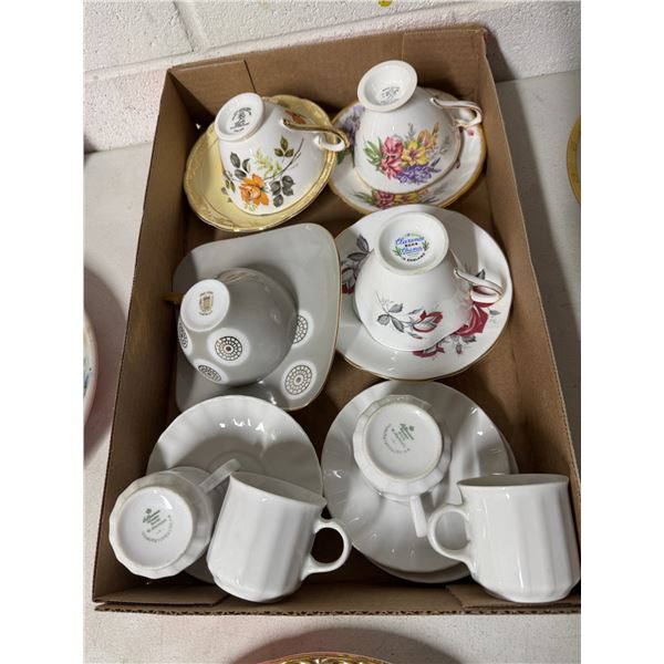 Tea cups, and demitasse cups, and saucers