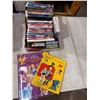 Image 1 : DVDs, VHS's puzzles, etc.