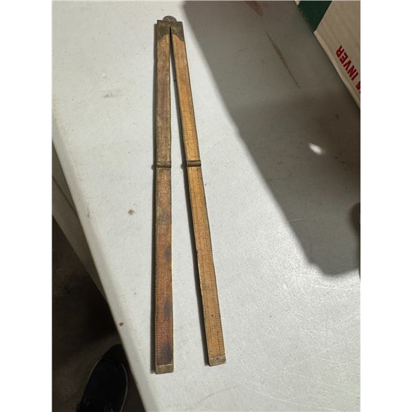 Antique measure stick holding