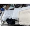 Image 1 : Assorted bedding and pillows
