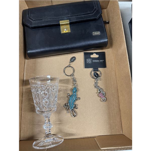 Hau's wallet, keychains, and crystal glass