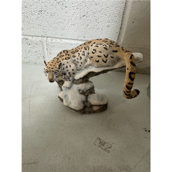Porcelain great cats of the world snow leopard