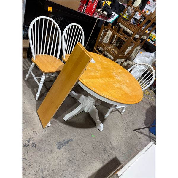 Pedestal table, 3 chairs and a leaf